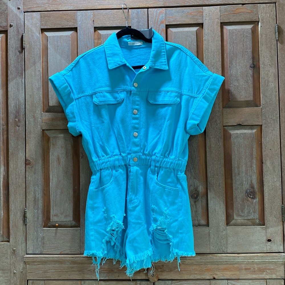 Gorge blue romper with fringed bottoms